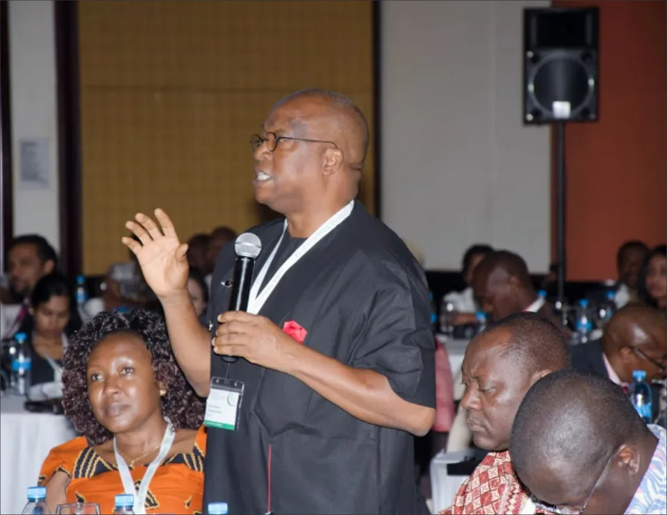 Addressing Conference Delegates