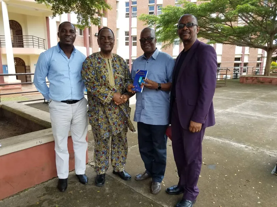 Professor Wole Adamolekun with academic colleagues